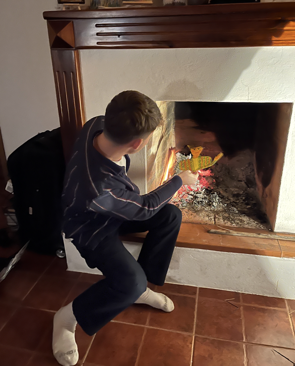 Eamon participating in the Ecuadorian tradition of making a paper doll of himself and burning it on New Year's Eve.